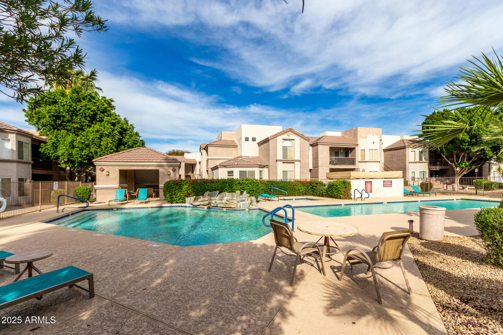 17017 North 12th Street, Unit 1123 Phoenix, AZ 85022 - Photo 1 of 48 a view of a house with a yard and sitting area