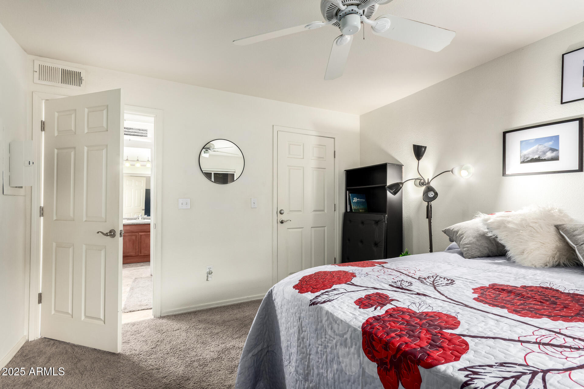 17017 North 12th Street, Unit 1123 Phoenix, AZ 85022 - Photo 18 of 48 a bedroom with a bed and a chandelier