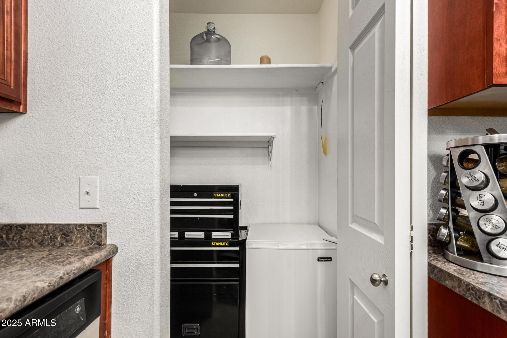 17017 North 12th Street, Unit 1123 Phoenix, AZ 85022 - Photo 22 of 48 a kitchen with a stove and a refrigerator