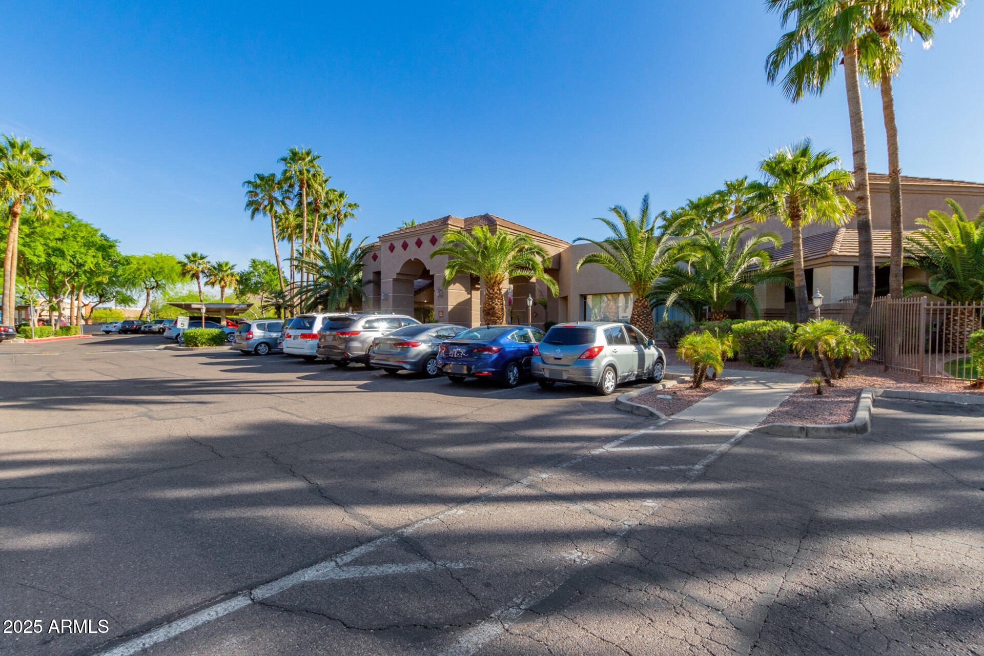 17017 North 12th Street, Unit 1123 Phoenix, AZ 85022 - Photo 33 of 48 a cars parked on the side of the street