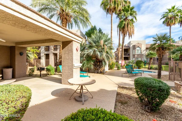 a building outdoor space with patio furniture