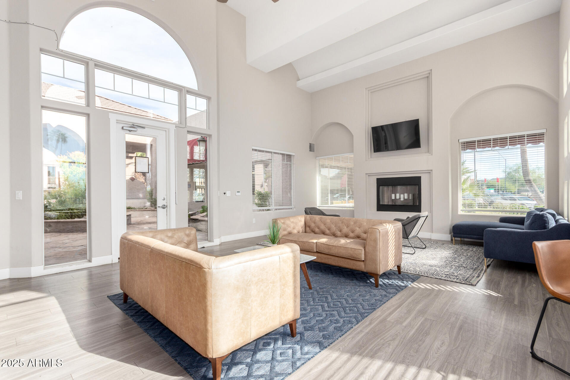 17017 North 12th Street, Unit 1123 Phoenix, AZ 85022 - Photo 39 of 48 a living room with furniture and a fireplace