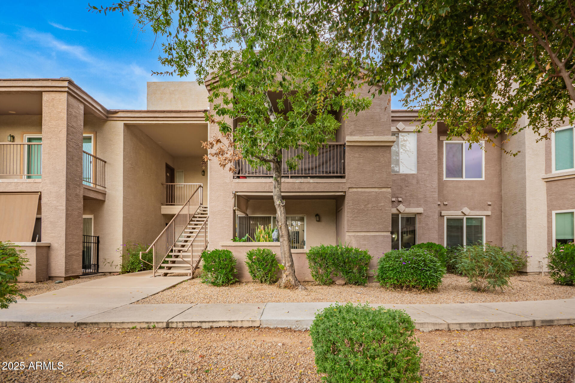 17017 North 12th Street, Unit 1123 Phoenix, AZ 85022 - Photo 4 of 48 a front view of a house with a yard