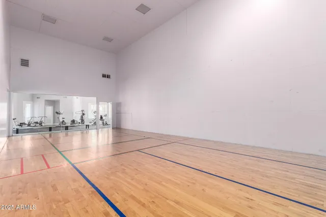 a view of a living room and kitchen