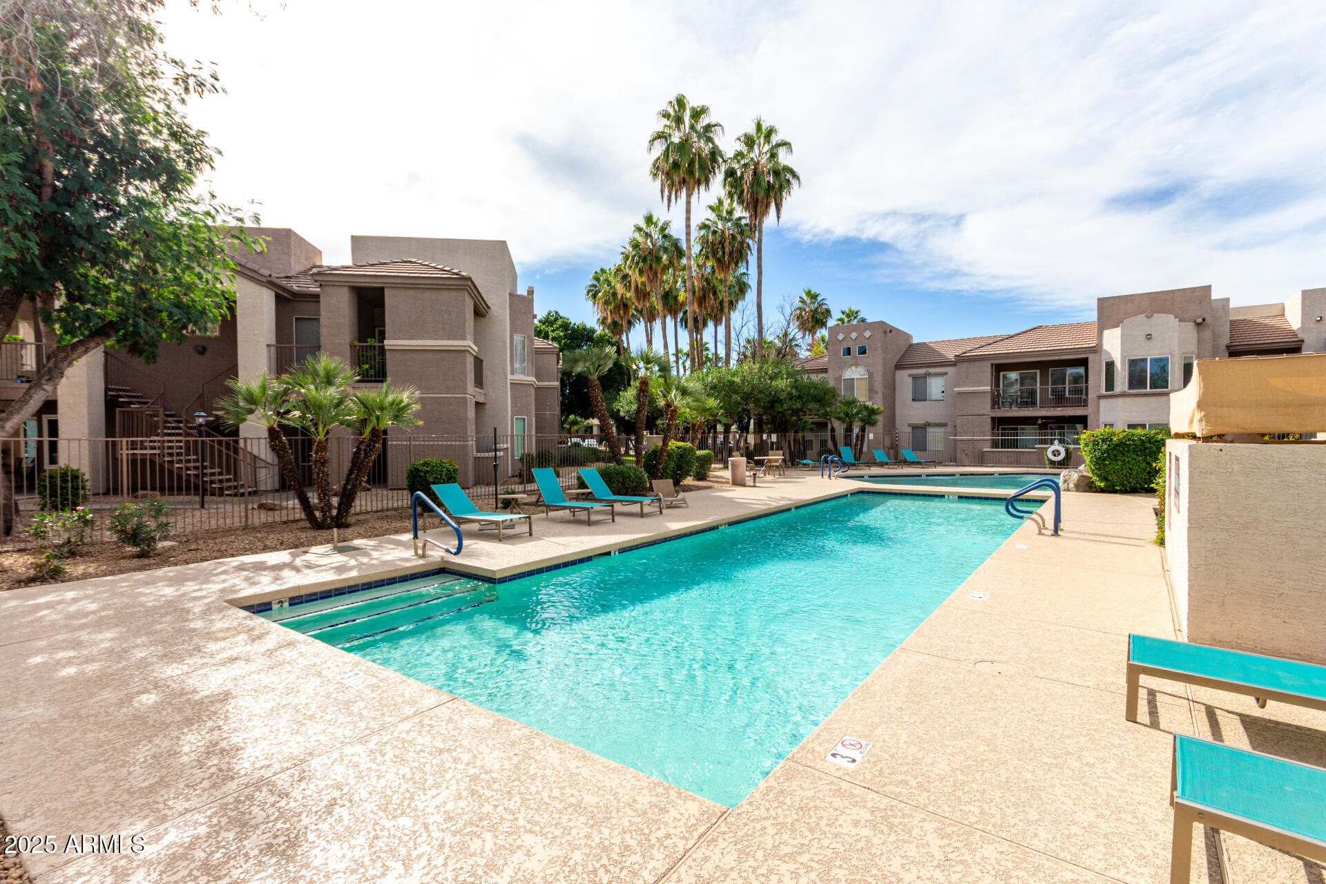 17017 North 12th Street, Unit 1123 Phoenix, AZ 85022 - Photo 47 of 48 a view of a house with a yard and sitting area