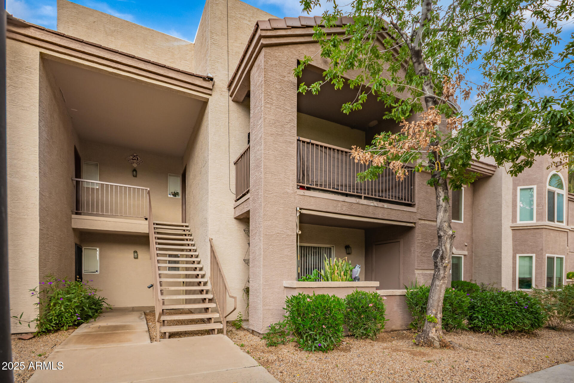 17017 North 12th Street, Unit 1123 Phoenix, AZ 85022 - Photo 5 of 48 a view of a house with a tree