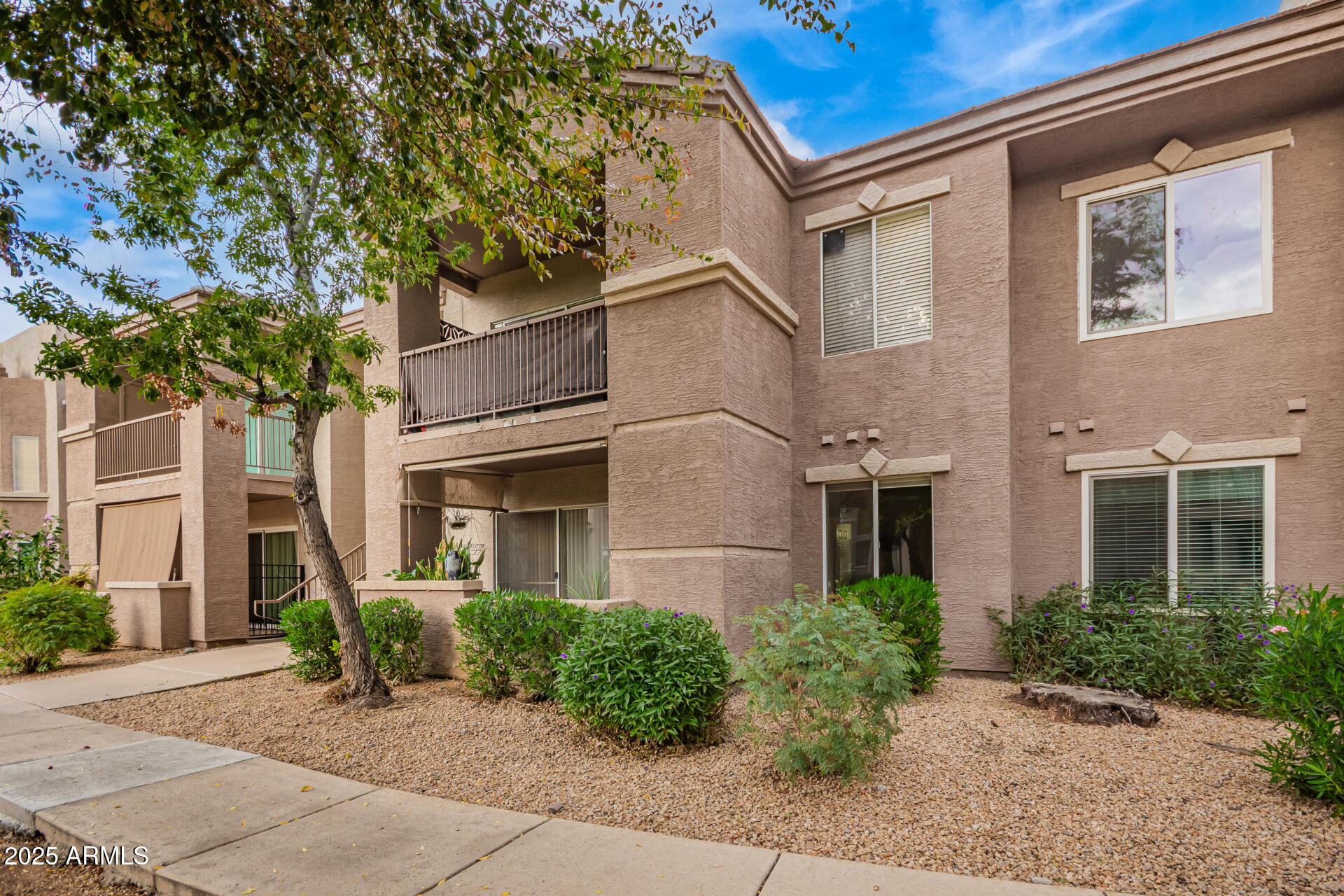 17017 North 12th Street, Unit 1123 Phoenix, AZ 85022 - Photo 6 of 48 a front view of a house with garden