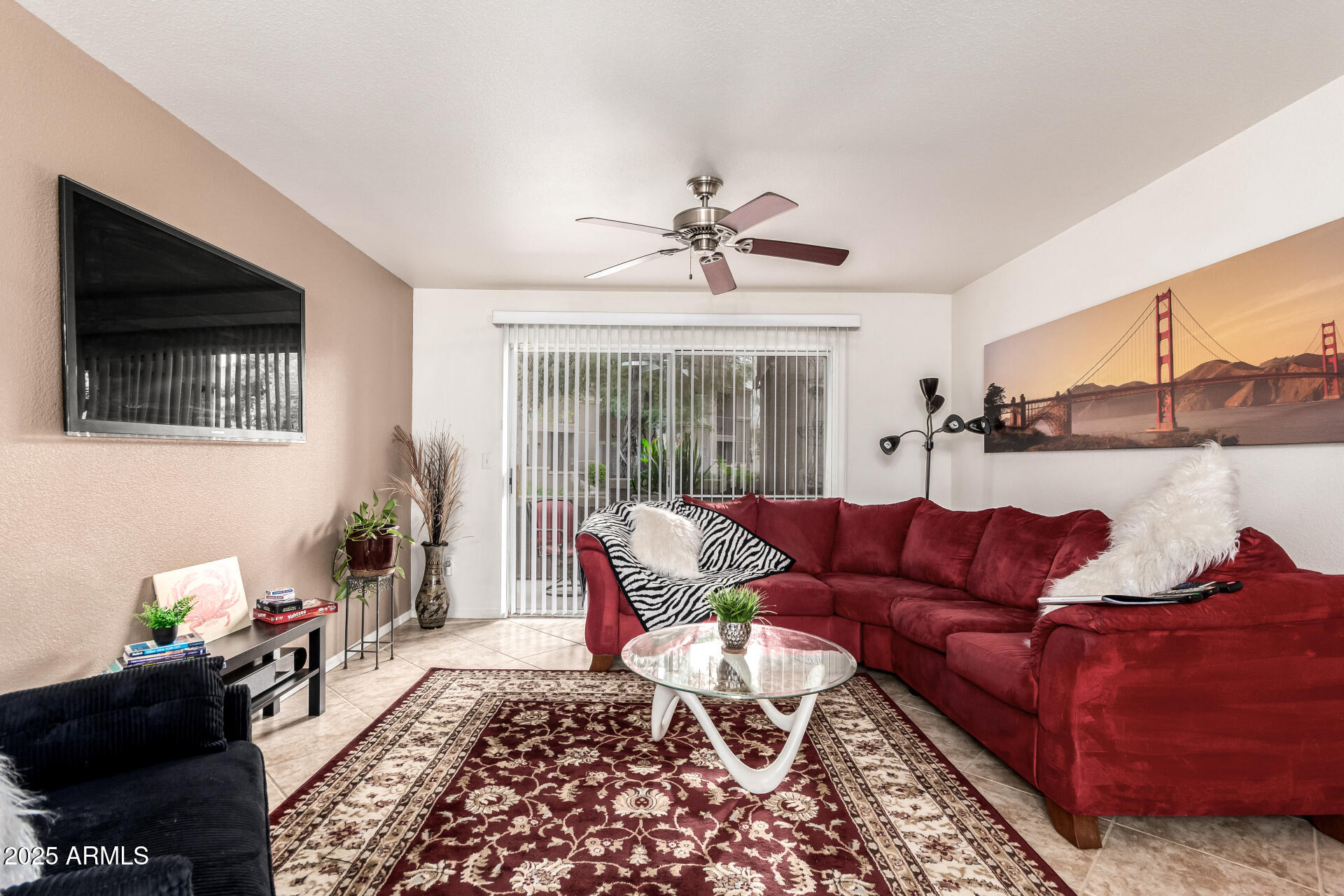 17017 North 12th Street, Unit 1123 Phoenix, AZ 85022 - Photo 8 of 48 a living room with furniture and a flat screen tv