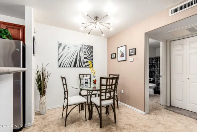 a view of a dining room with furniture