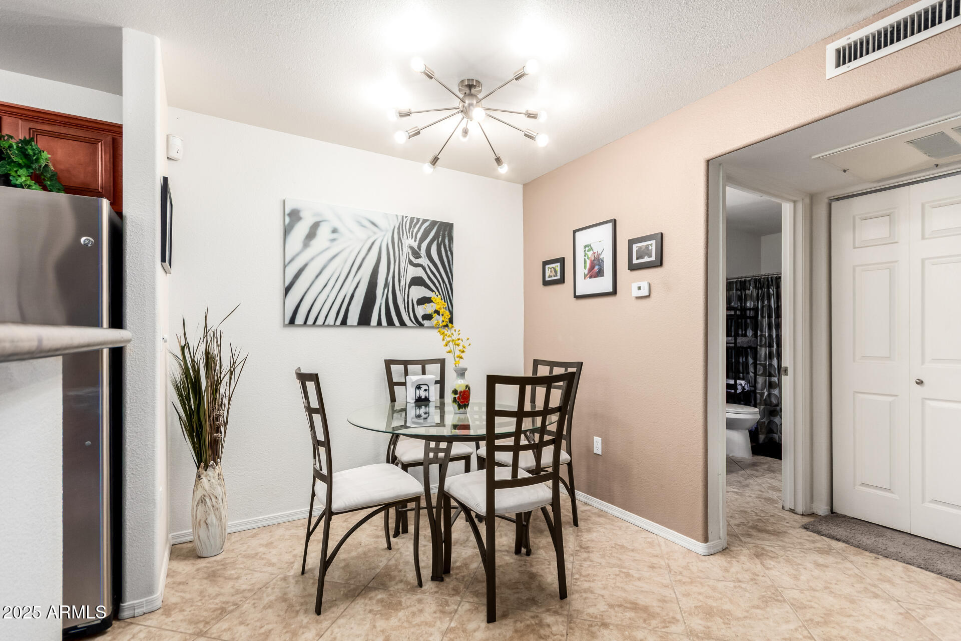 17017 North 12th Street, Unit 1123 Phoenix, AZ 85022 - Photo 10 of 48 a view of a dining room with furniture
