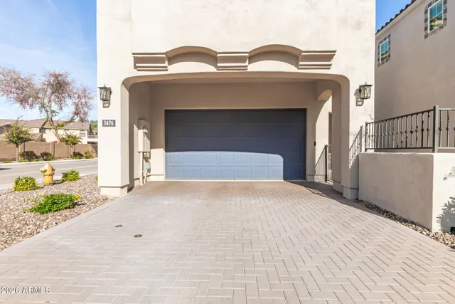 a view of hotel and hall with wooden floor
