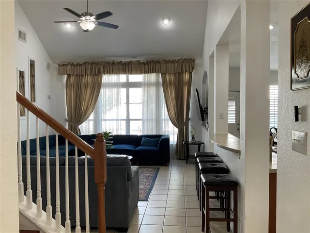 a view of a living room and furniture