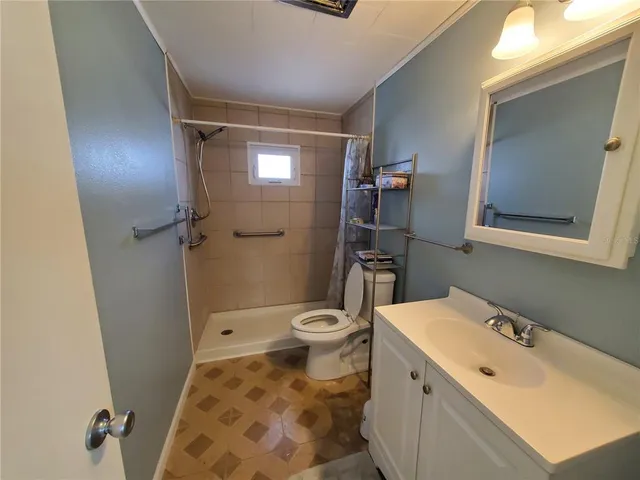 a room with furniture and wooden floor