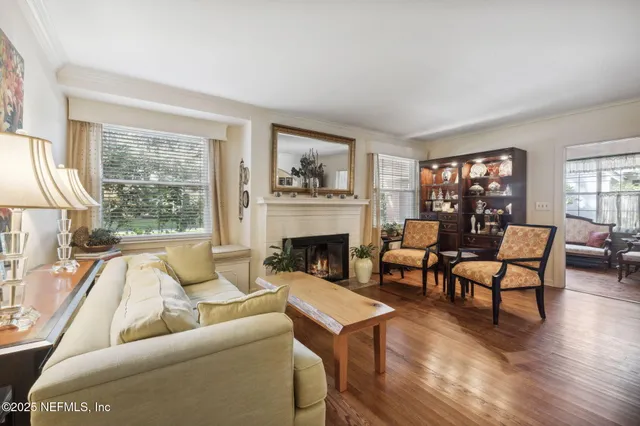 a view of a brick house with a large window