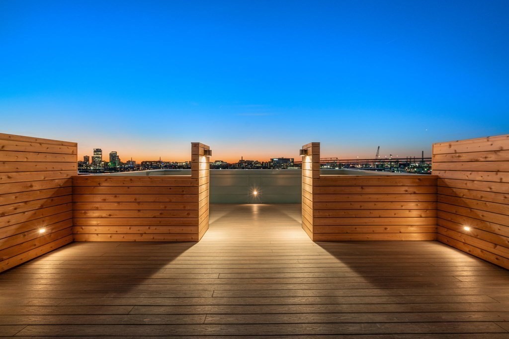 301 Border Street, Unit 406 Boston, MA 02128 - Photo 29 of 38 a view of a balcony with an ocean view