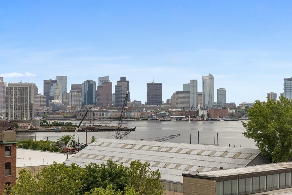301 Border Street, Unit 406 Boston, MA 02128 - Photo 6 of 38 a view of a city with tall buildings