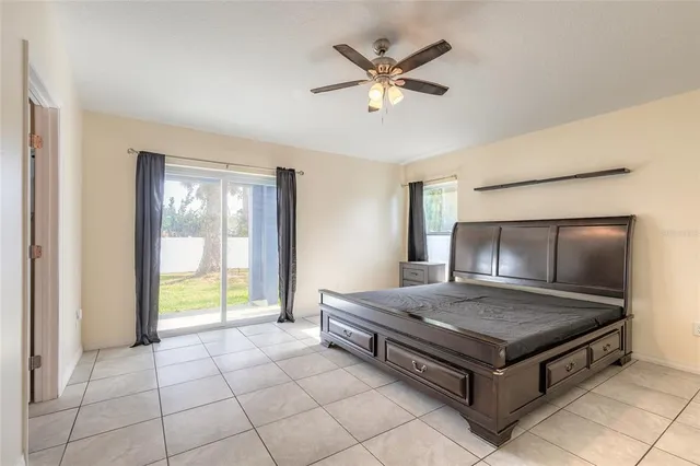 a living room with a bed and furniture