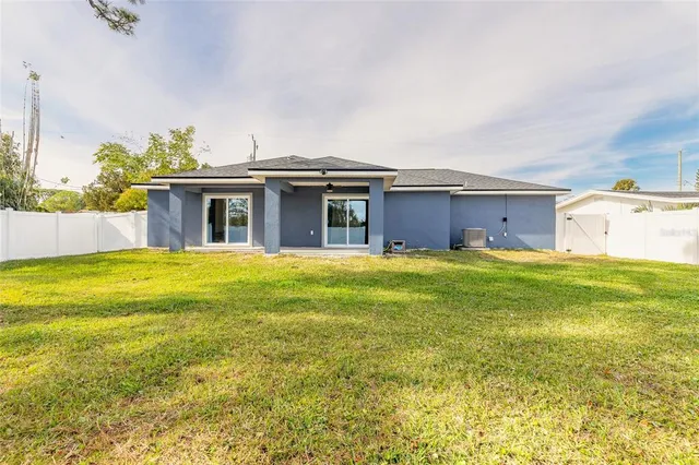 a view of a house with a swimming pool
