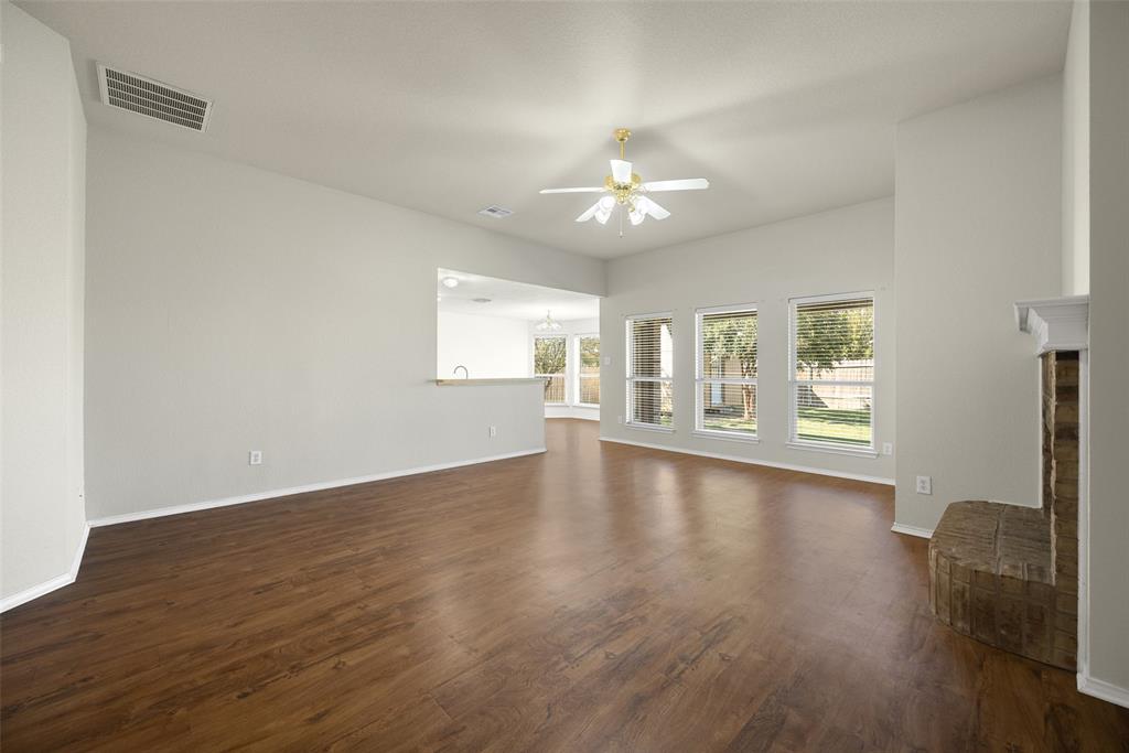 324 Meadow Ridge Drive Anna, TX 75409 - Photo 5 of 32 Laminate flooring throughout