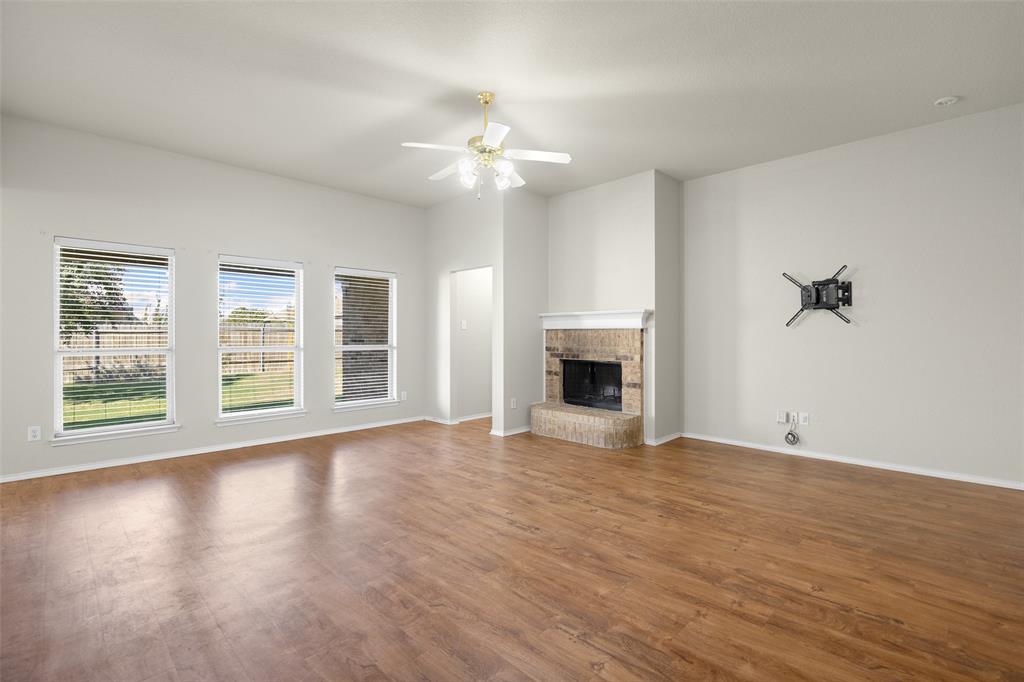 324 Meadow Ridge Drive Anna, TX 75409 - Photo 8 of 32 Wall of windows overlooking the backyard