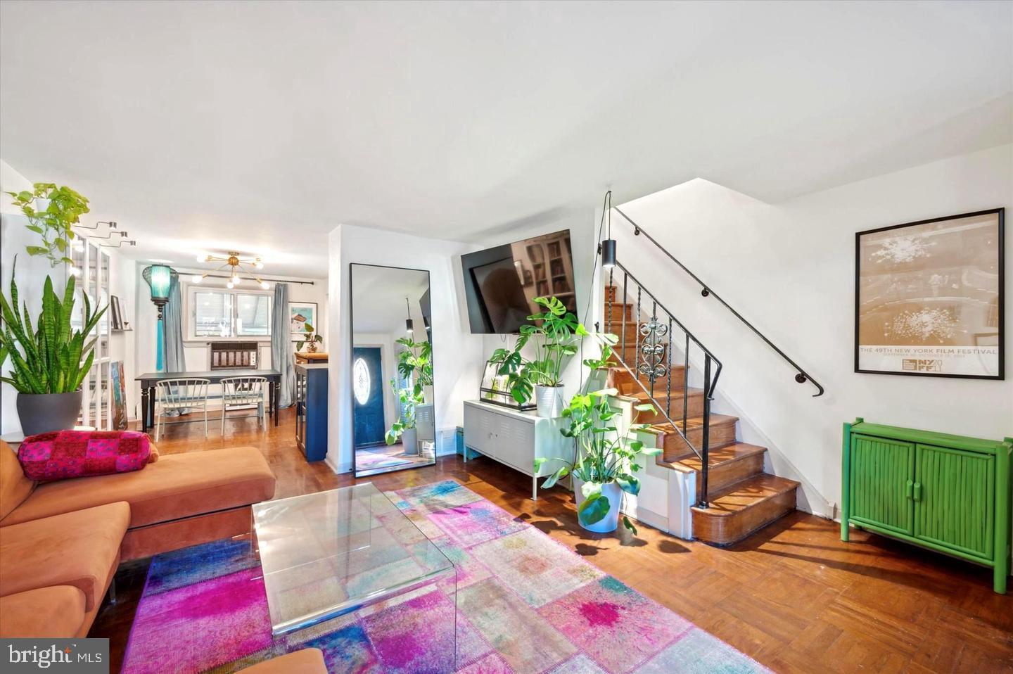 4572 Manayunk Avenue Philadelphia, PA 19128 - Photo 5 of 22 a living room with furniture and wooden floor
