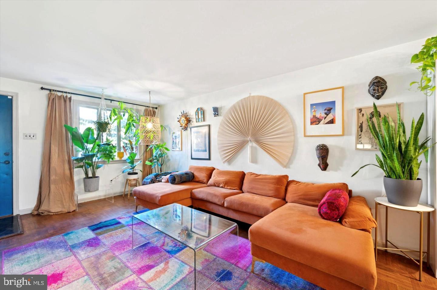 4572 Manayunk Avenue Philadelphia, PA 19128 - Photo 6 of 22 a living room with furniture and a large window