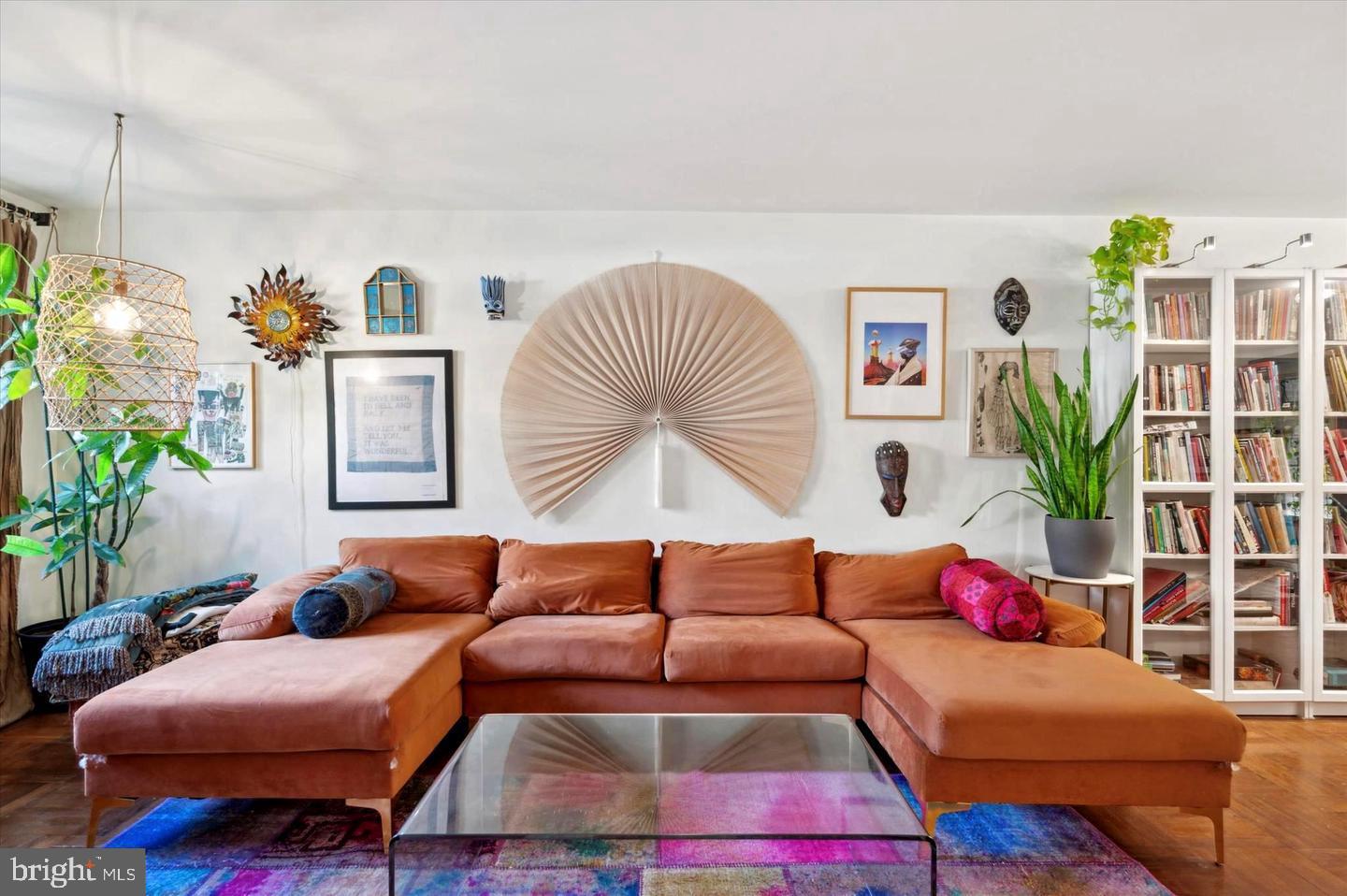 4572 Manayunk Avenue Philadelphia, PA 19128 - Photo 7 of 22 a living room with furniture and a potted plant