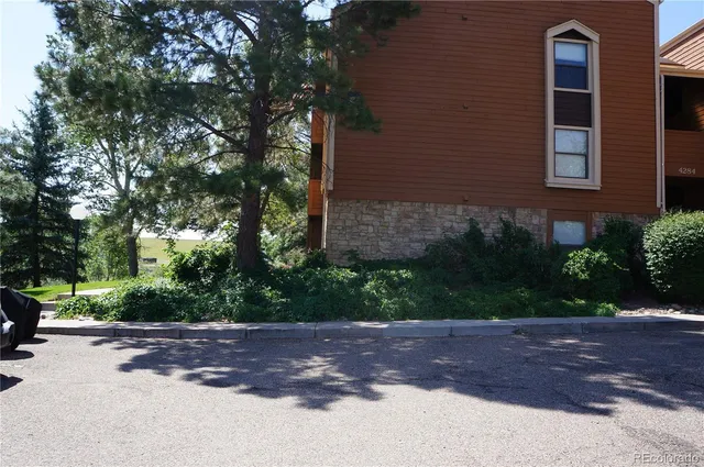 a view of a house with a street