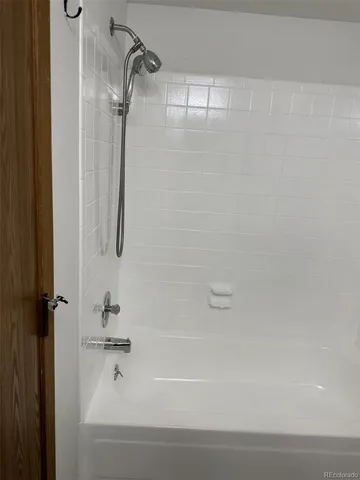 a close view of a bathtub in bathroom