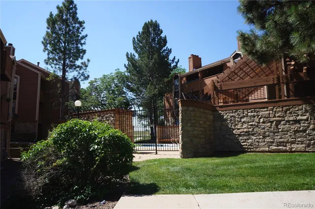 a view of a house with a garden