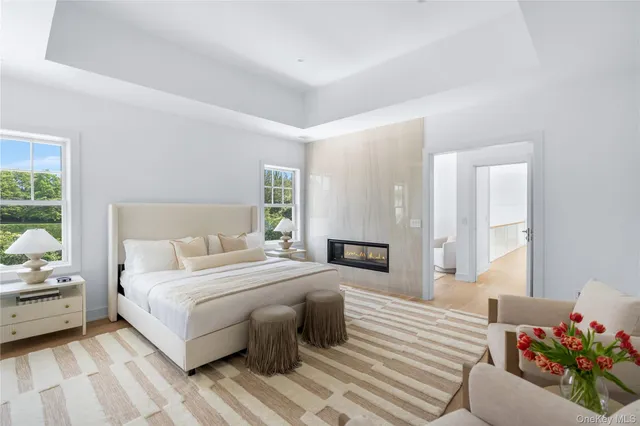 a bedroom with a bed and a couch