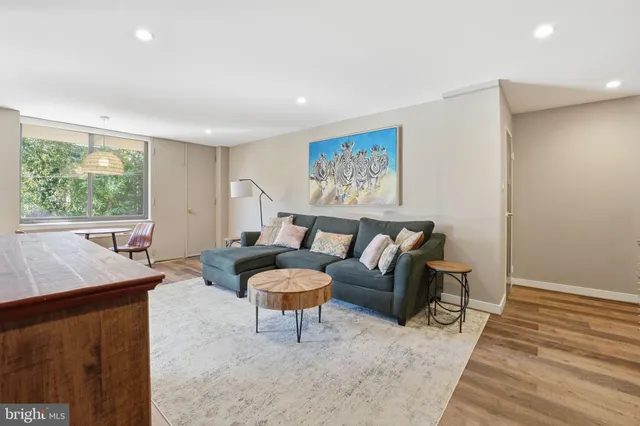 a view of a livingroom with furniture and window