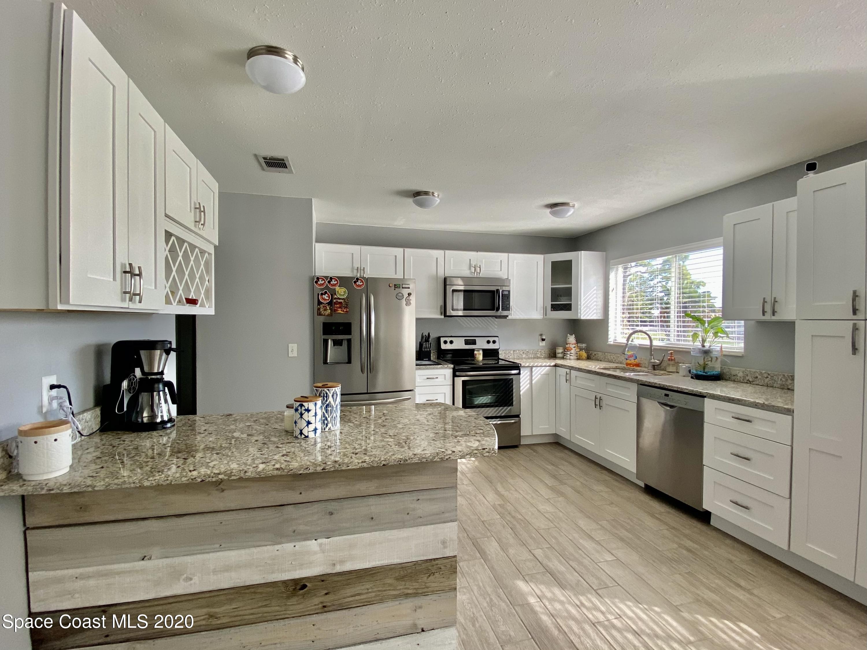 1241 Bard Lane Northeast Palm Bay, FL 32905 - Photo 3 of 7 IMG_1745