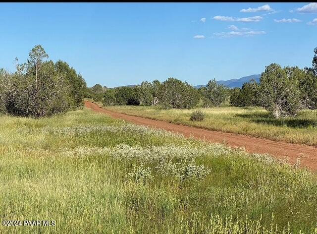2714 West Plate Road Ash Fork, AZ 86320 - Photo 3 of 6 a view of an ocean beach and mountain