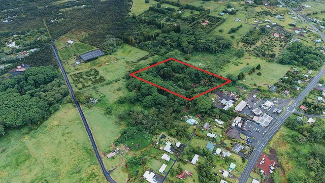 a view of a yard from a balcony