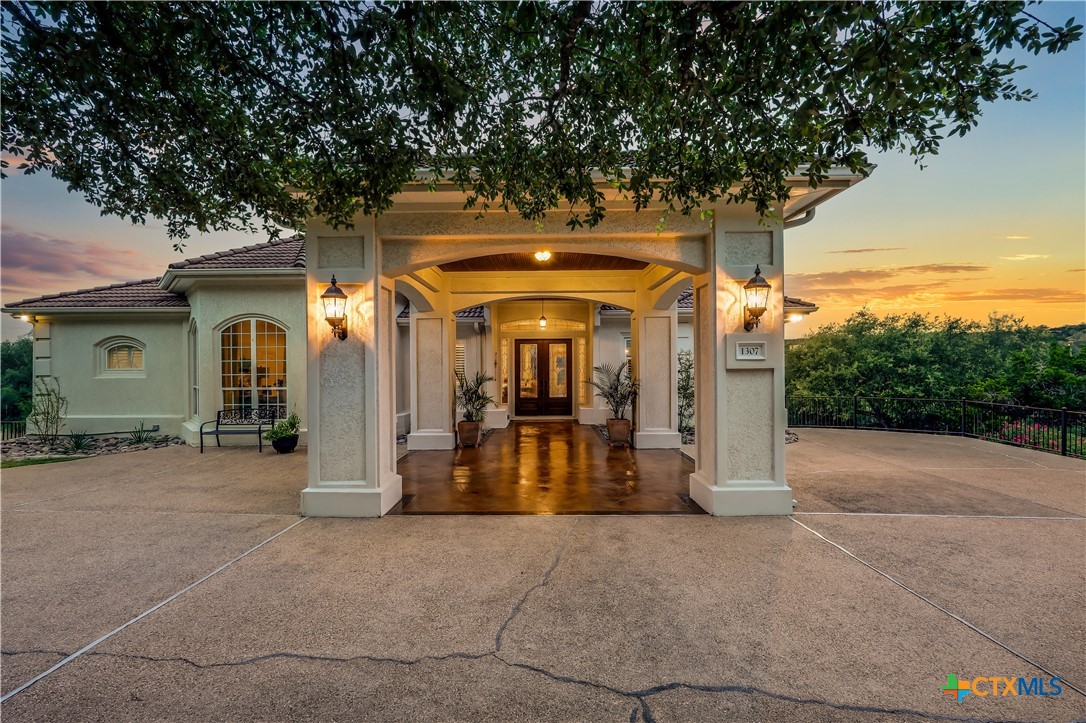 a view of a house with porch and furniture