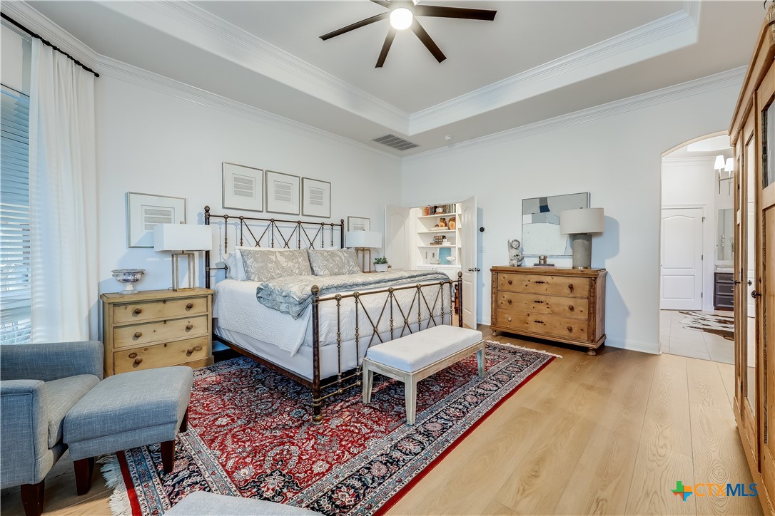 1307 Osprey Ridge Loop Lago Vista, TX 78645 - Photo 15 of 40 a bedroom with furniture and a rug