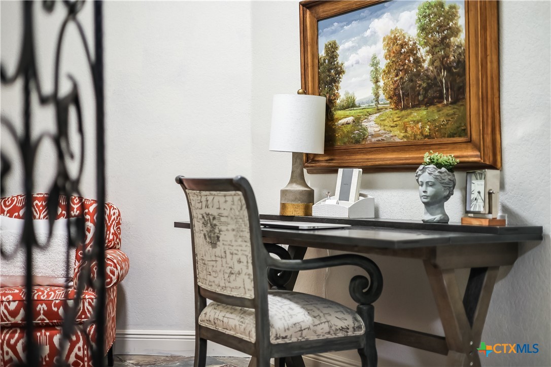 1307 Osprey Ridge Loop Lago Vista, TX 78645 - Photo 28 of 40 a view of a dining room with furniture and window