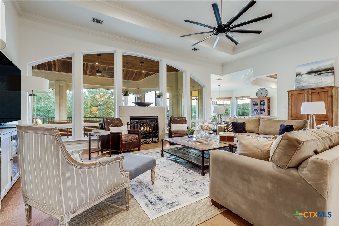1307 Osprey Ridge Loop Lago Vista, TX 78645 - Photo 4 of 40 a living room with furniture and a large window