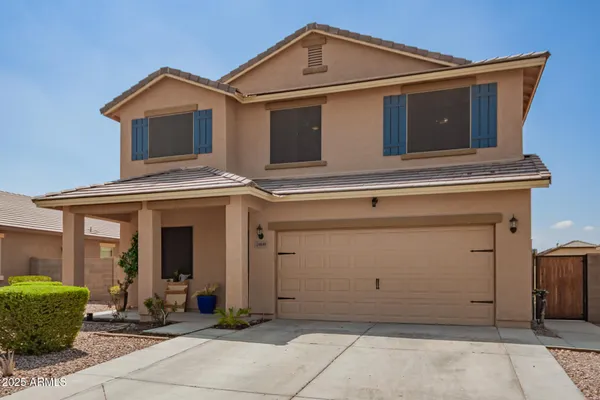 a view of a house with garage