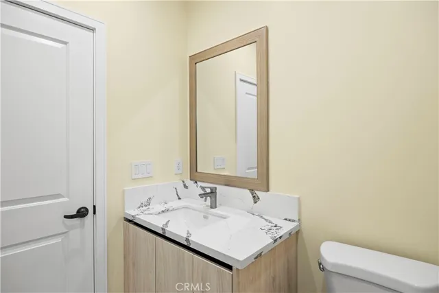 a bathroom with a sink and a toilet