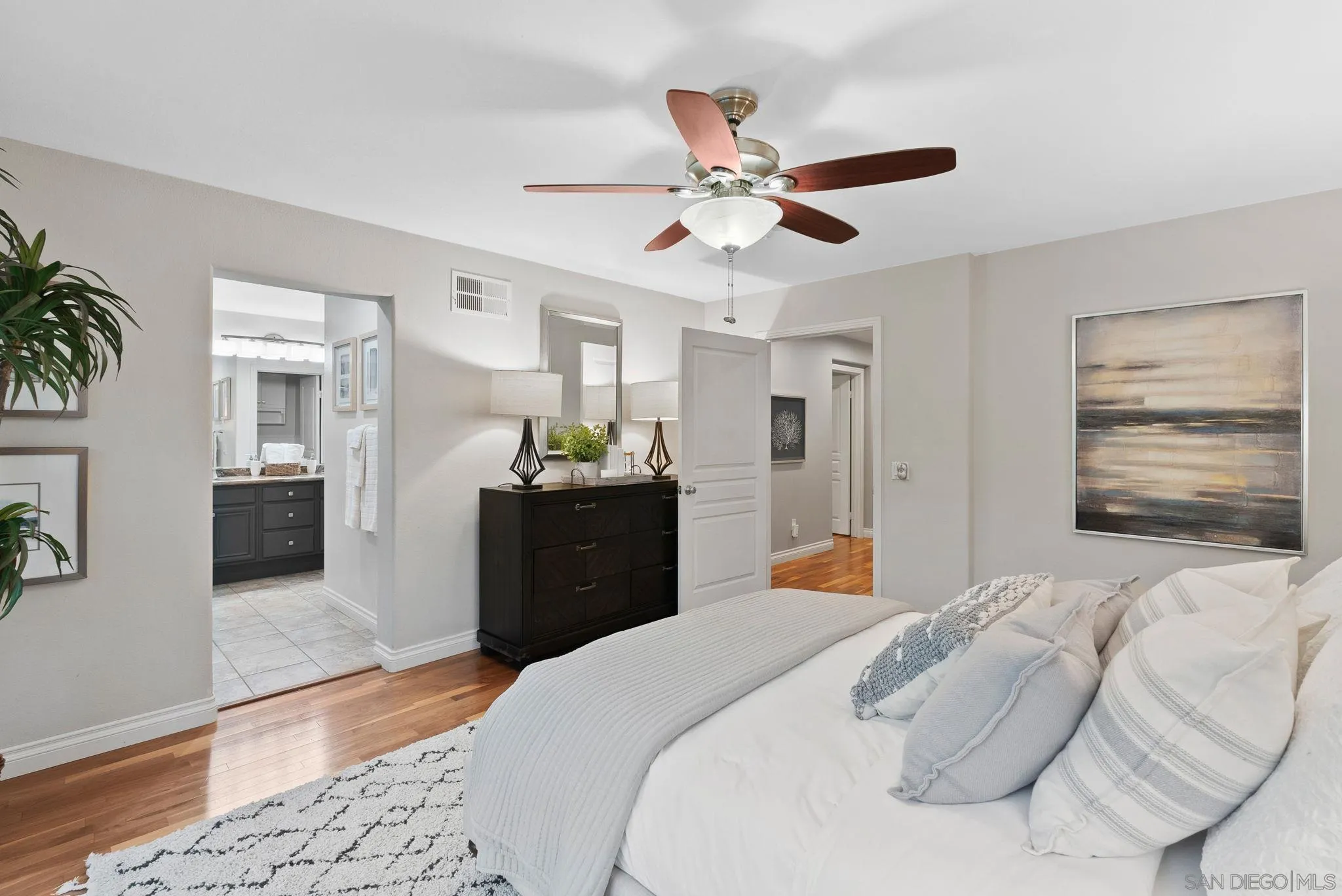 735 River Rock Road Chula Vista, CA 91914 - Photo 21 of 53 a bedroom with a bed and ceiling fan