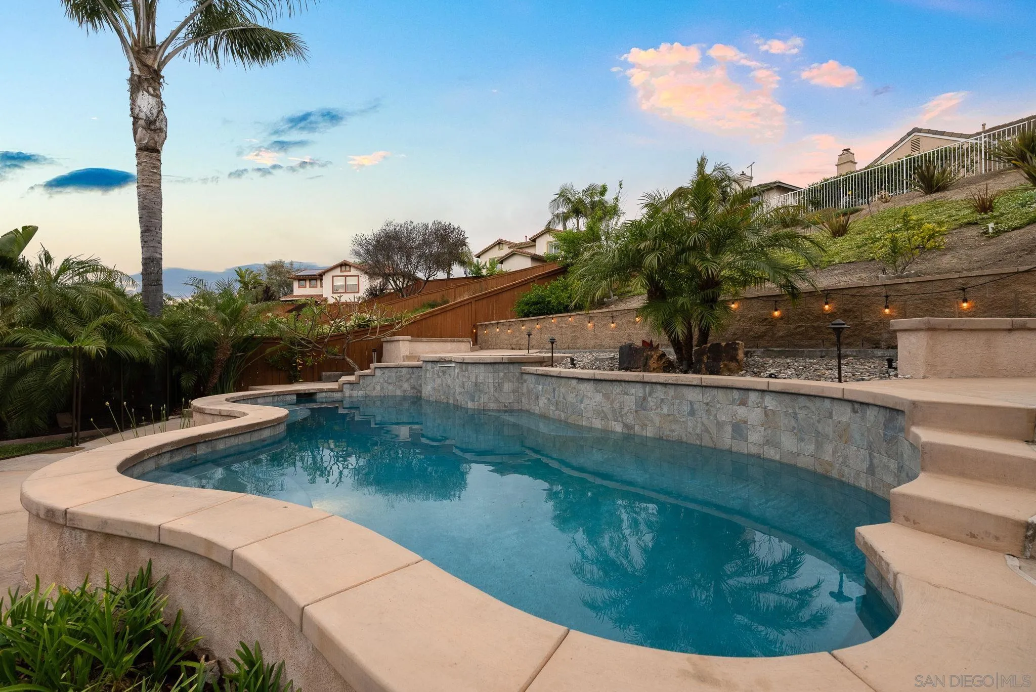 735 River Rock Road Chula Vista, CA 91914 - Photo 38 of 53 a view of a swimming pool with a sitting area