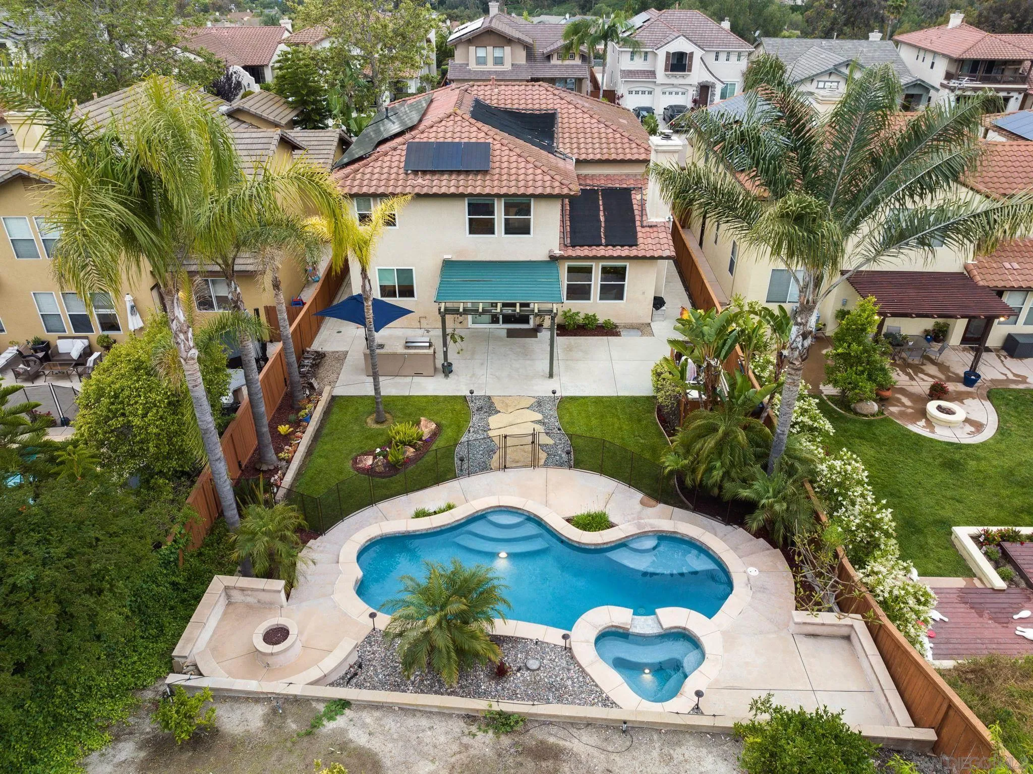 735 River Rock Road Chula Vista, CA 91914 - Photo 43 of 53 an aerial view of a house with garden space and sitting area