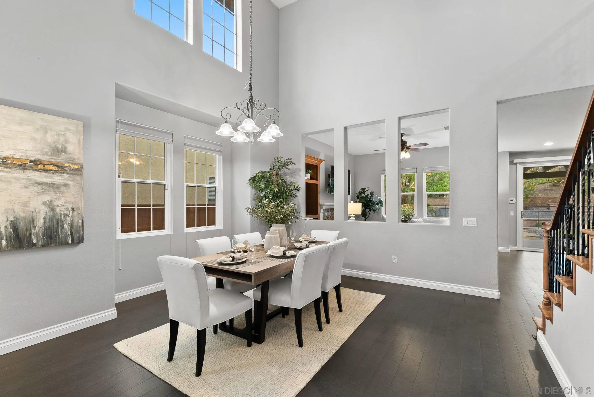 735 River Rock Road Chula Vista, CA 91914 - Photo 8 of 53 a dining room with furniture a livingroom and chandelier