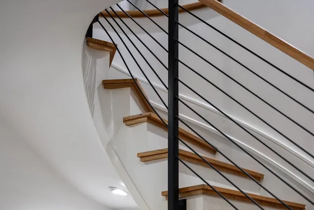 a spacious bedroom with a bed and a couch