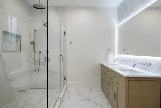 a bathroom with a bathtub and toilet