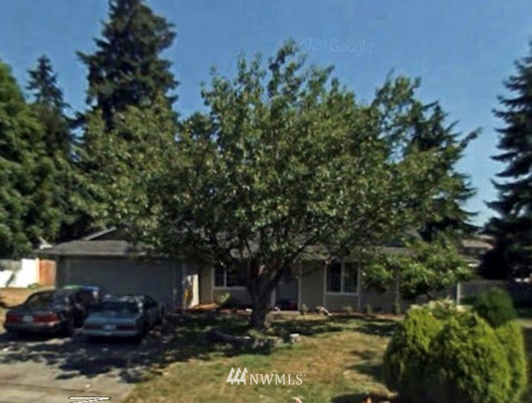 33712 40th Court Southwest Federal Way, WA 98023 - Photo 1 of 1 a front view of a house with garden