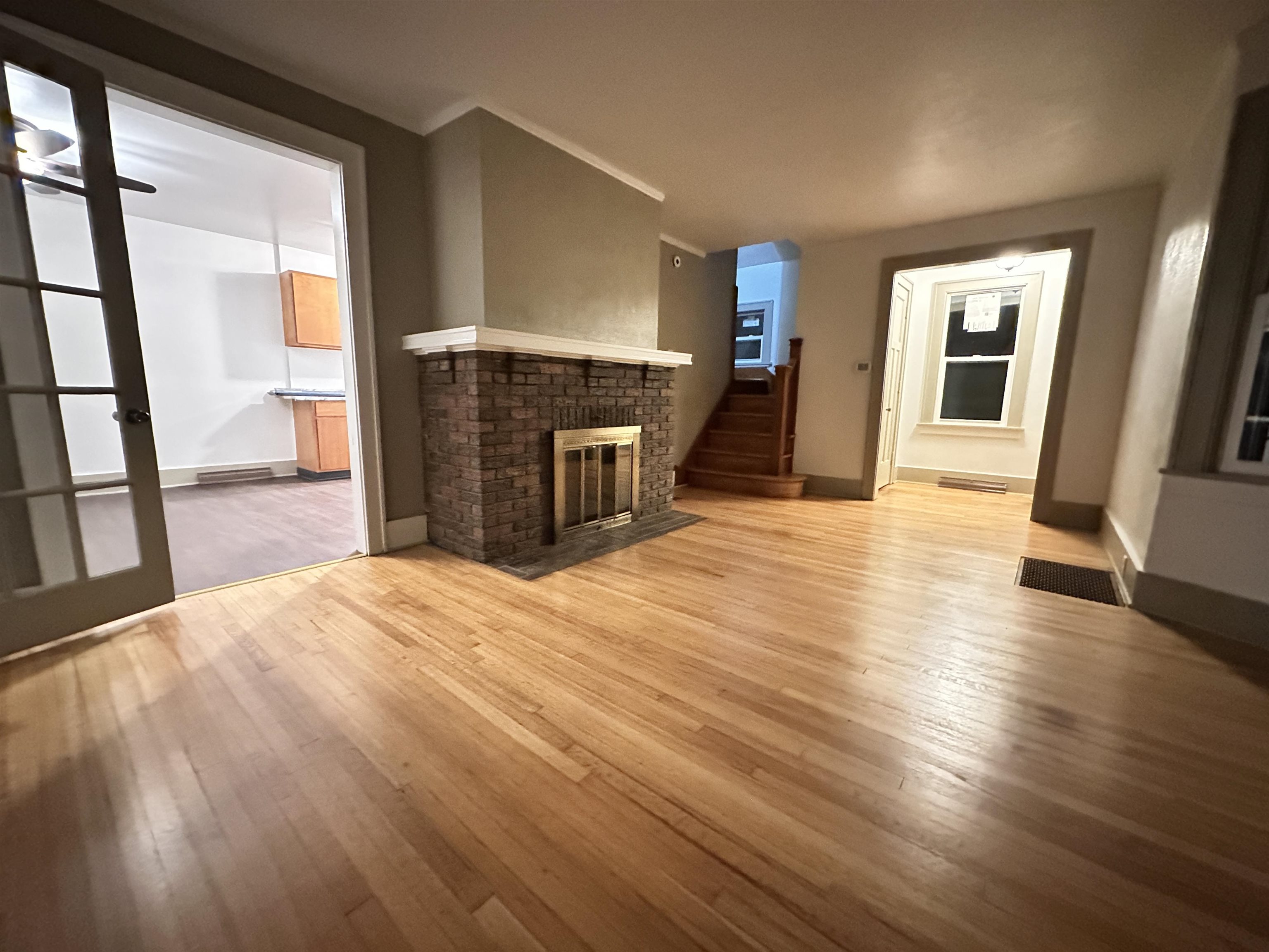 816 South Harlem Avenue Freeport, IL 61032 - Photo 14 of 33 a view of a livingroom with wooden floor and a fireplace