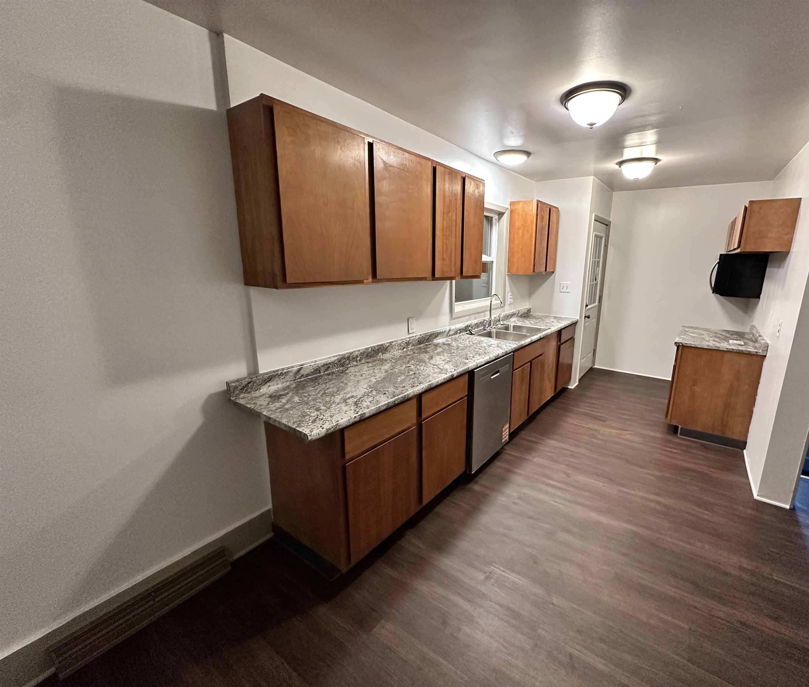 816 South Harlem Avenue Freeport, IL 61032 - Photo 16 of 33 a kitchen with stainless steel appliances granite countertop a sink and a stove top oven